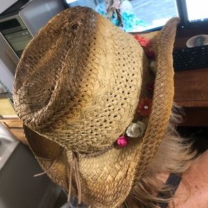 Straw Cowgirl hat with Flower band.